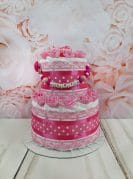 Tumeroosa väike mähkmetort lutiketiga 1