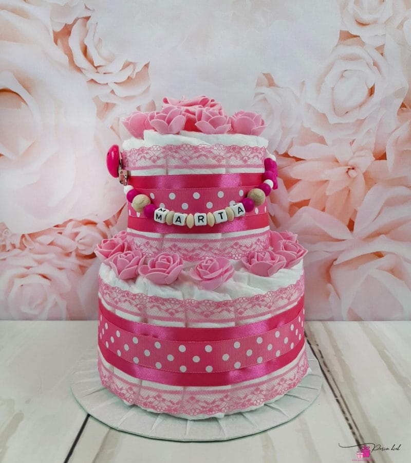 Tumeroosa väike mähkmetort lutiketiga 1