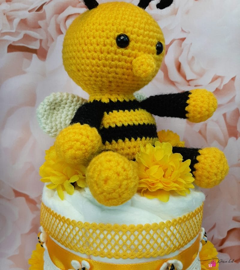 Kollane väike mähkmetort Amigurumiga 2 Kollane väike mähkmetort Amigurumiga 2