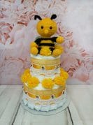 Kollane väike mähkmetort Amigurumiga