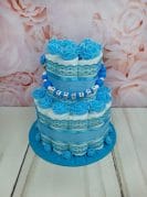 Tumesinine väike mähkmetort lutiketiga 1