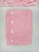 Käsitööna kootud beebitekk ja papud 3