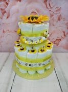 kollane väike mähkmetort lutiketiga