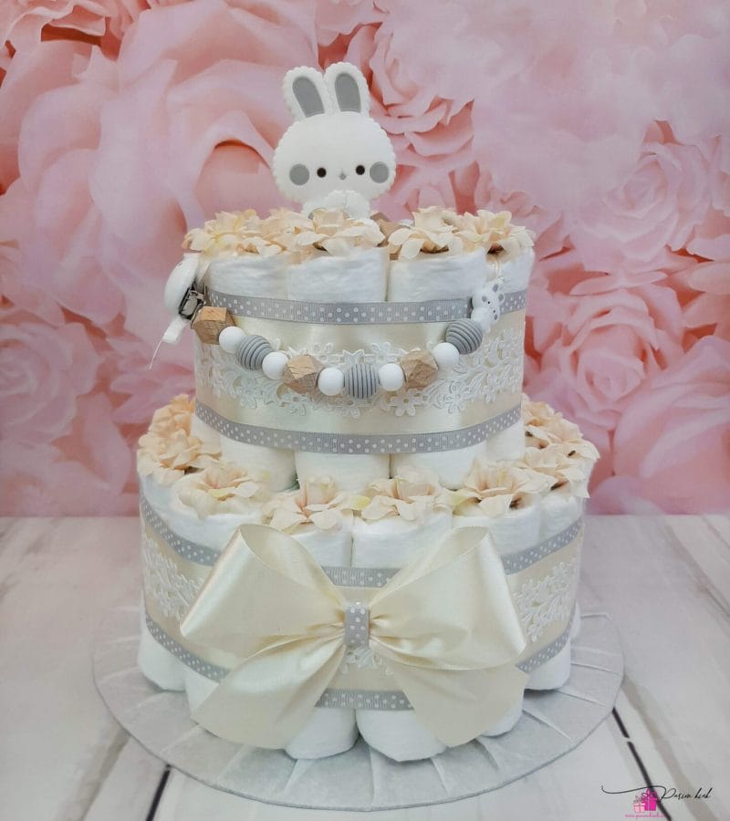 Beež mähkmetort lutiketi ja närimisrõngaga Beež mähkmetort lutiketi ja närimisrõngaga