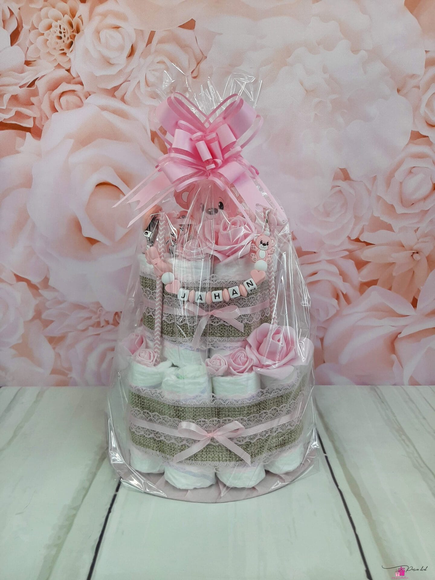 Roosa mähkmetort närimisrõnga ja lutiketiga