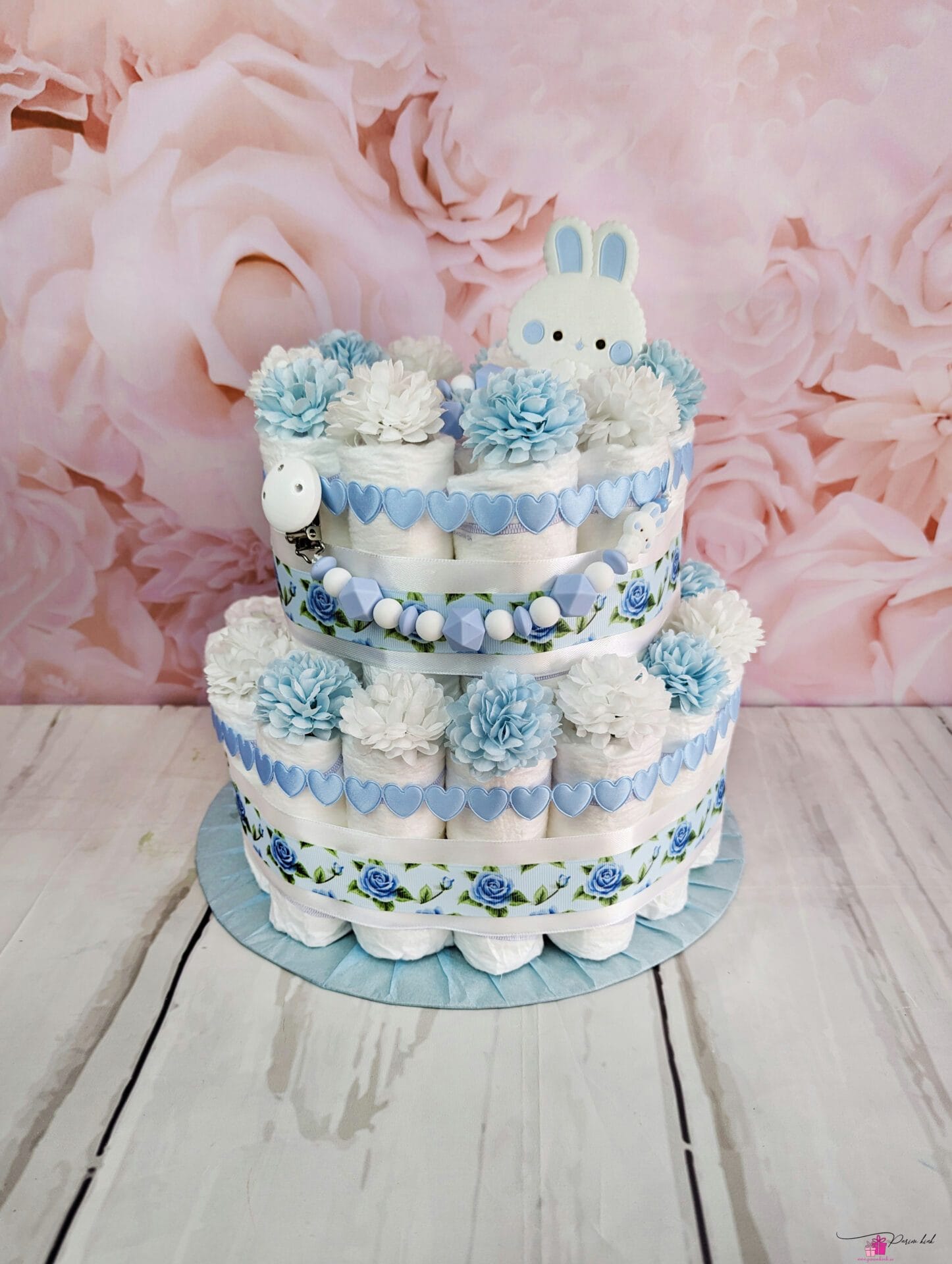 Sinine mähkmetort lutiketi ja närimisrõngaga