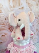 roosa mähkmetort elevandiga