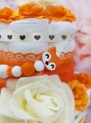 oranz väike mähkmetort lutiketiga 1