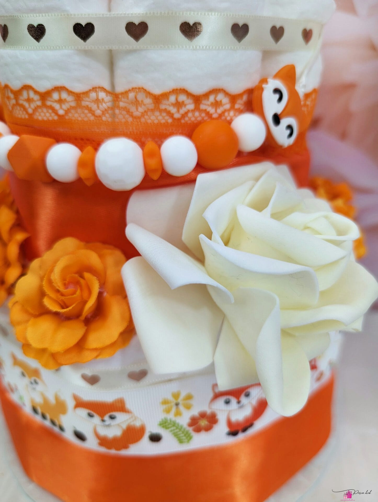 oranz väike mähkmetort lutiketiga 2