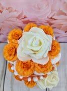 oranz väike mähkmetort lutiketiga