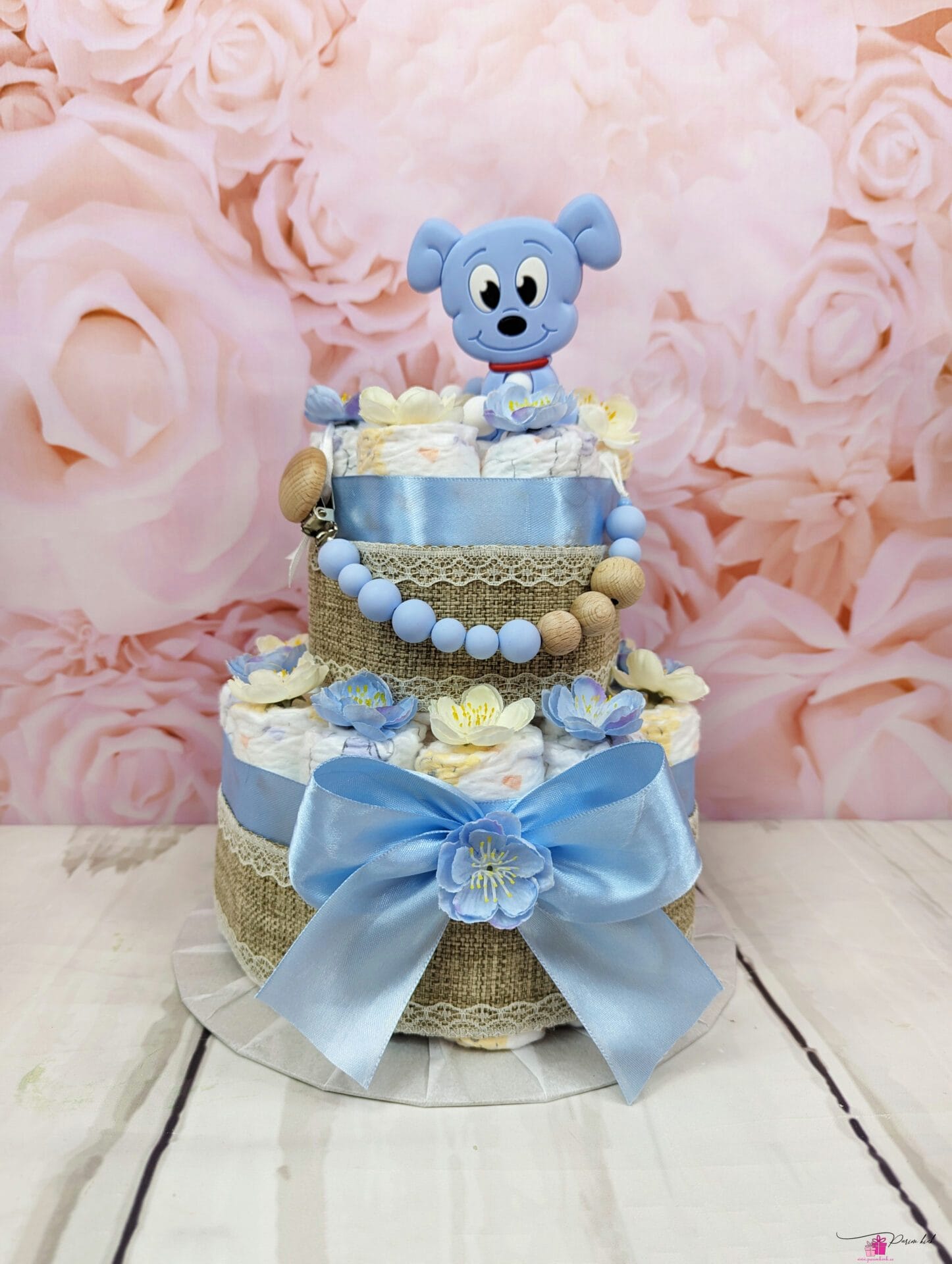 helesinine mähkmetort lutiketi ja närimisrõngaga