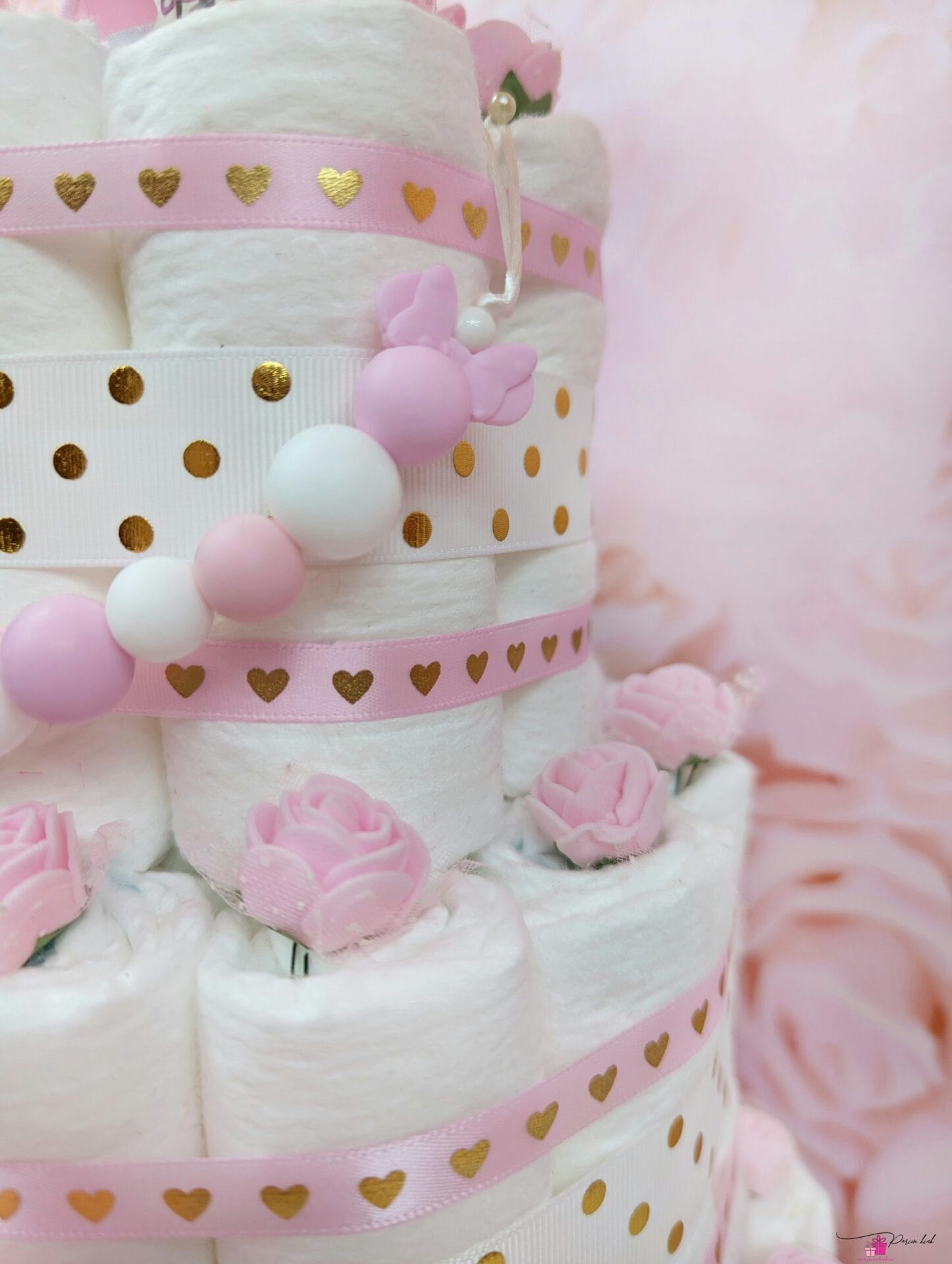 Heleroosa täpiline mähkmetort lutiketiga 12