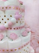 Heleroosa täpiline mähkmetort lutiketiga 12