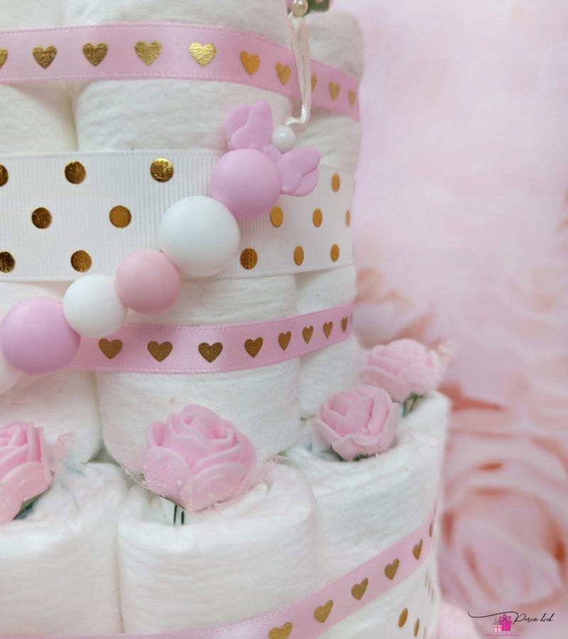 Heleroosa täpiline mähkmetort lutiketiga 12 Heleroosa täpiline mähkmetort lutiketiga 12