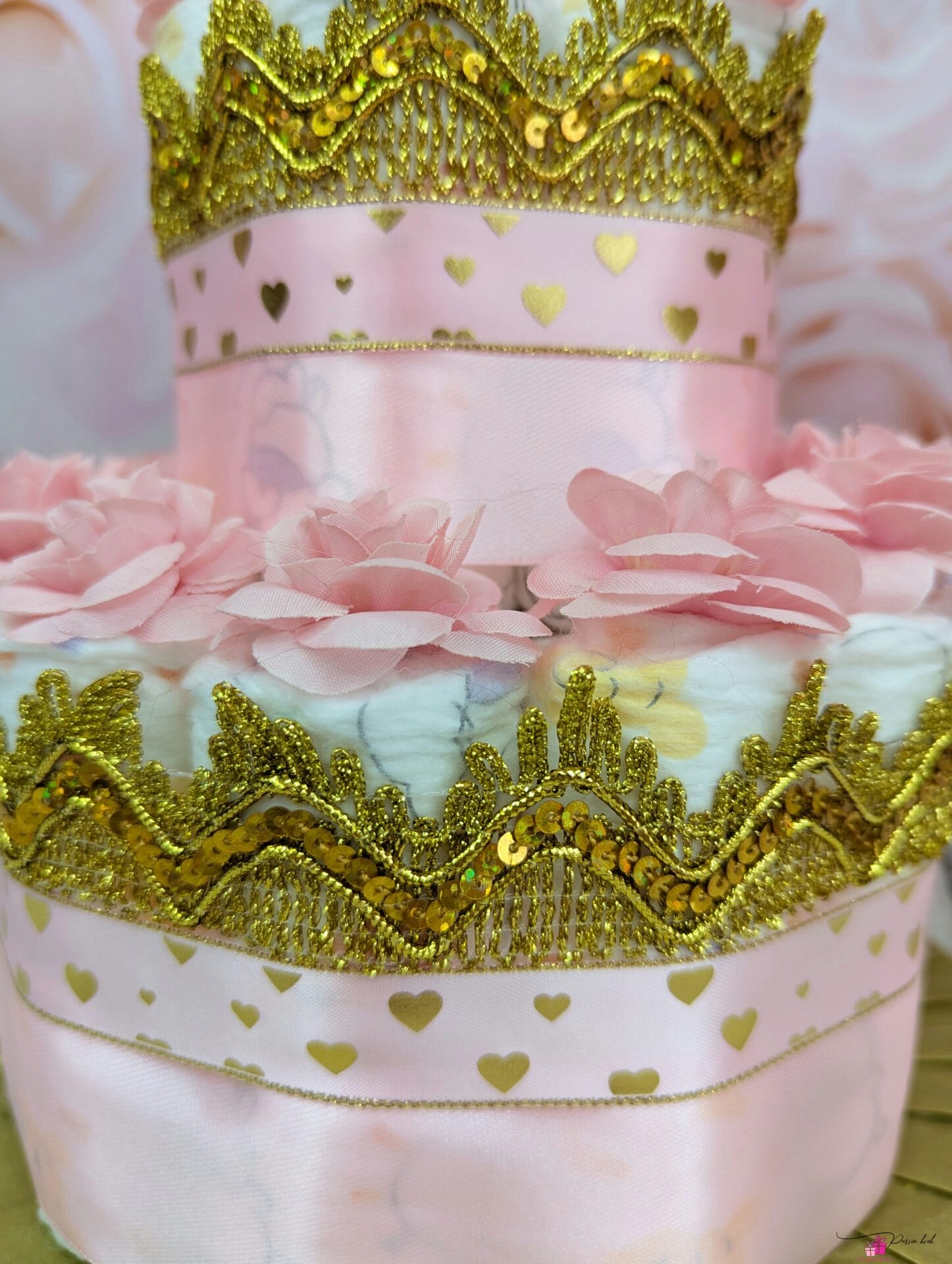 Roosa-Kuldne mähkmetort krooniga 1