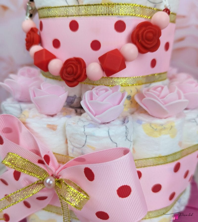 Roosa täpiline mähkmetort lutiketiga 1 Roosa täpiline mähkmetort lutiketiga 1