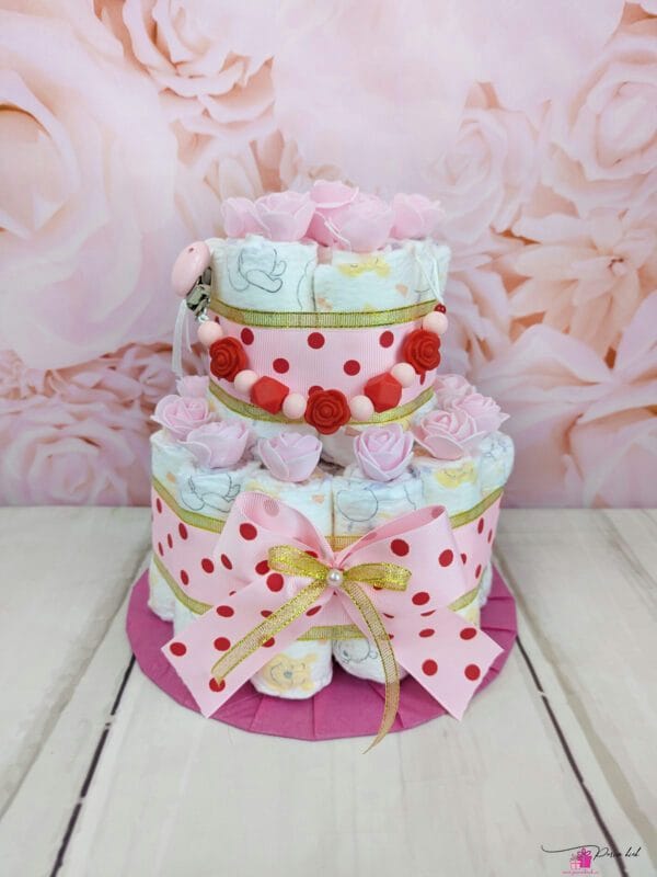 Roosa täpiline mähkmetort lutiketiga