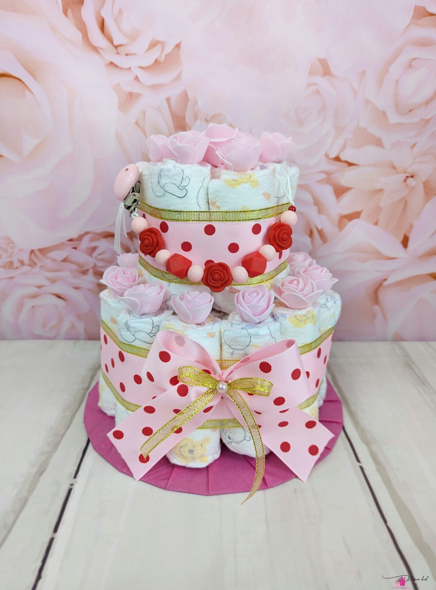 Roosa täpiline mähkmetort lutiketiga