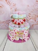 Roosa täpiline mähkmetort lutiketiga