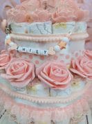 Virsikutooni satsidega mähkmetort lutiketiga 1