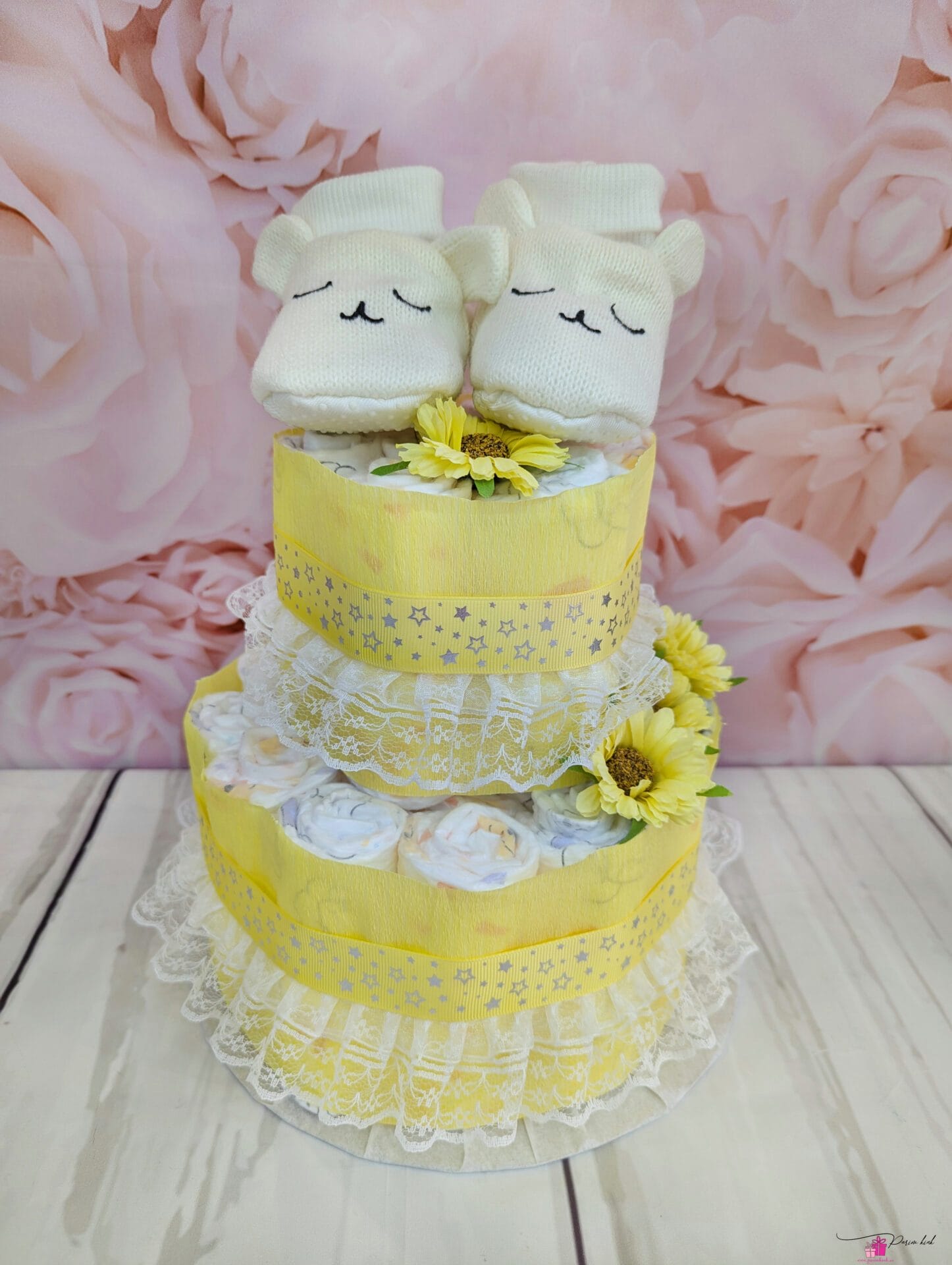 No vaadake neid mähkmetordi otsas olevaid papusid! Kas pole mitte nummid!?
Mähkmetort on valmistatud 25tk Pampers, Huggies või Muumi mähkmetest vastavalt Teie v